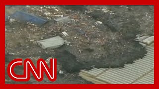 Watch a massive tsunami engulf entire towns in Japan 2011 [upl. by Herzberg]